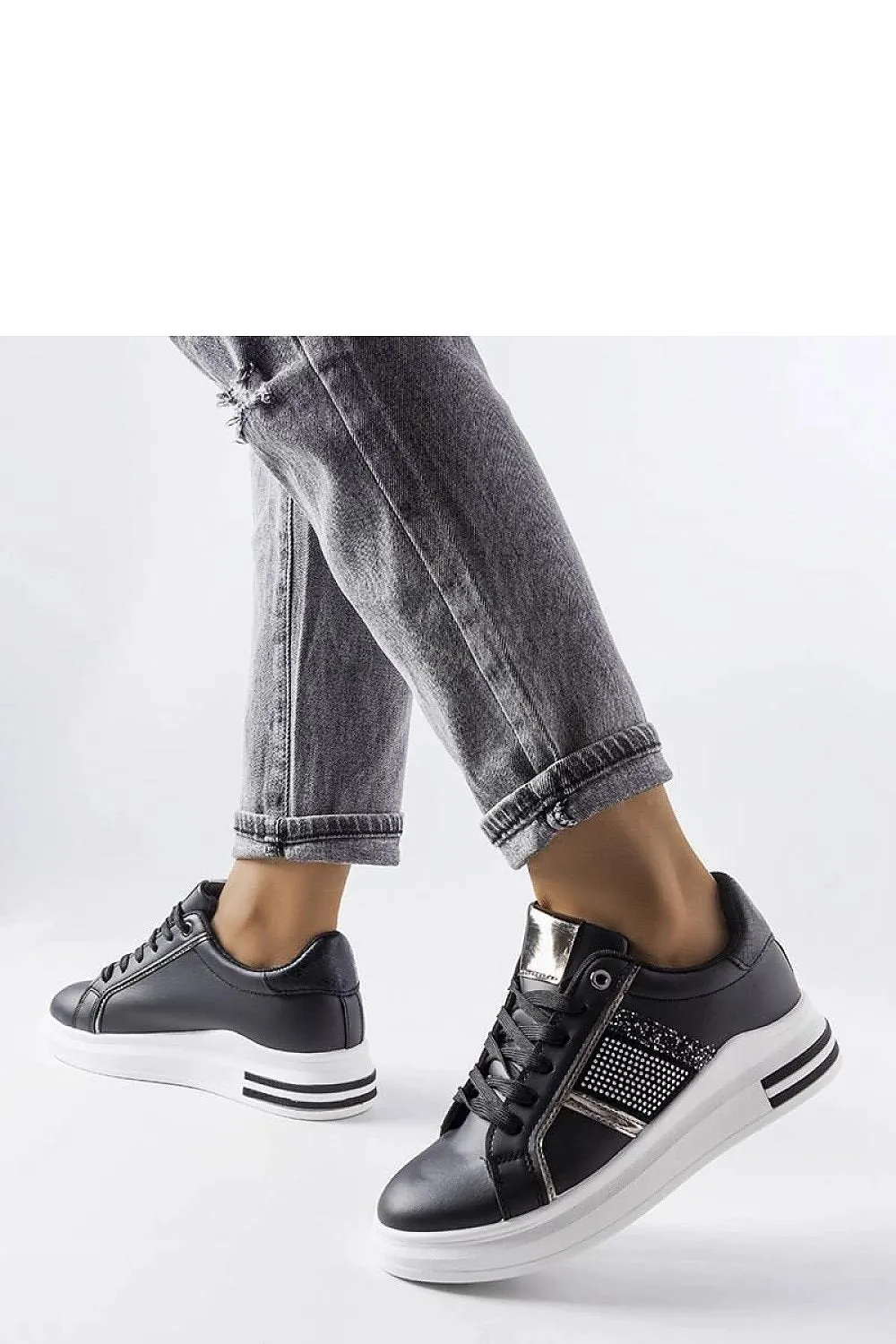 Beige sneakers adorned with rhinestones