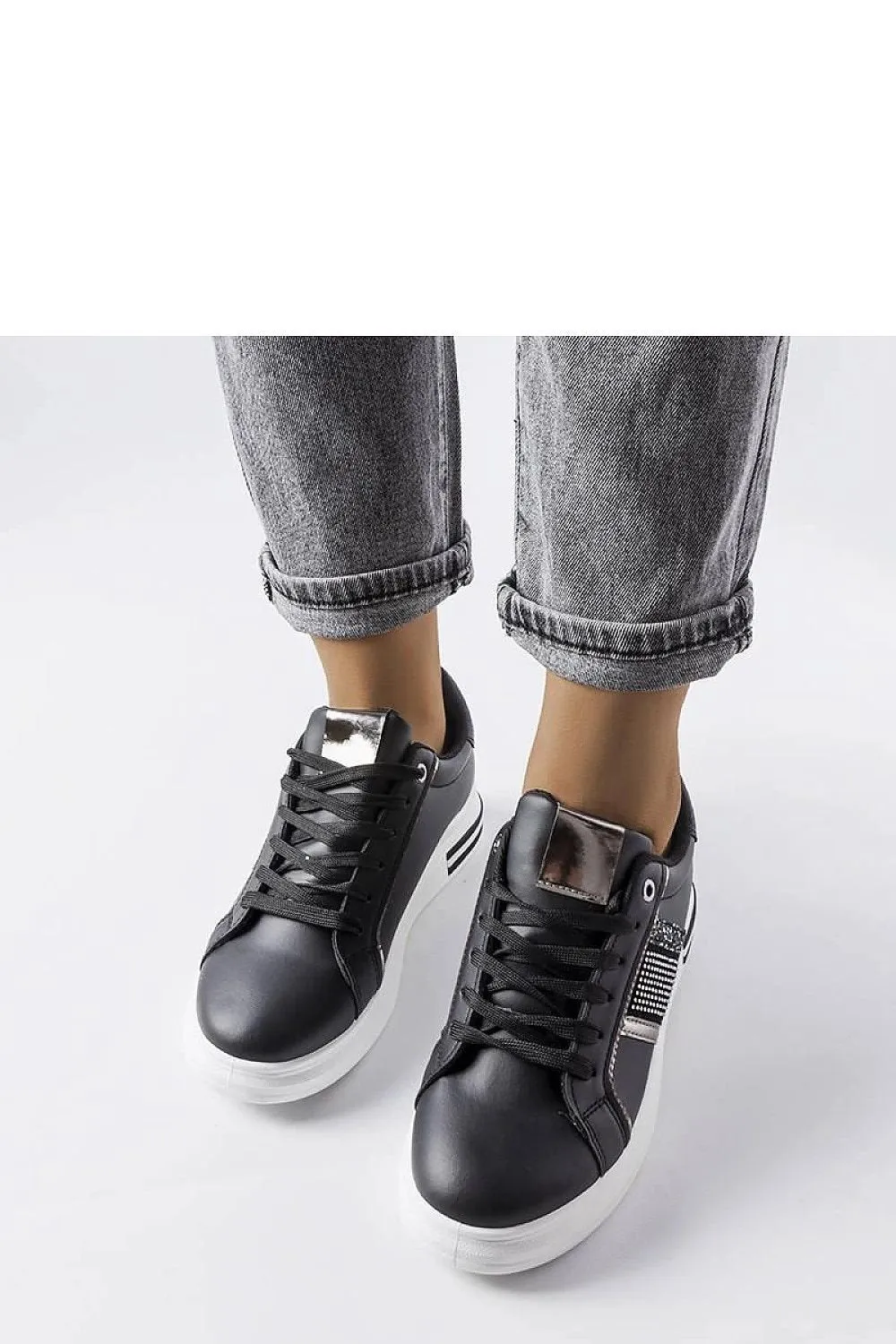 Beige sneakers adorned with rhinestones