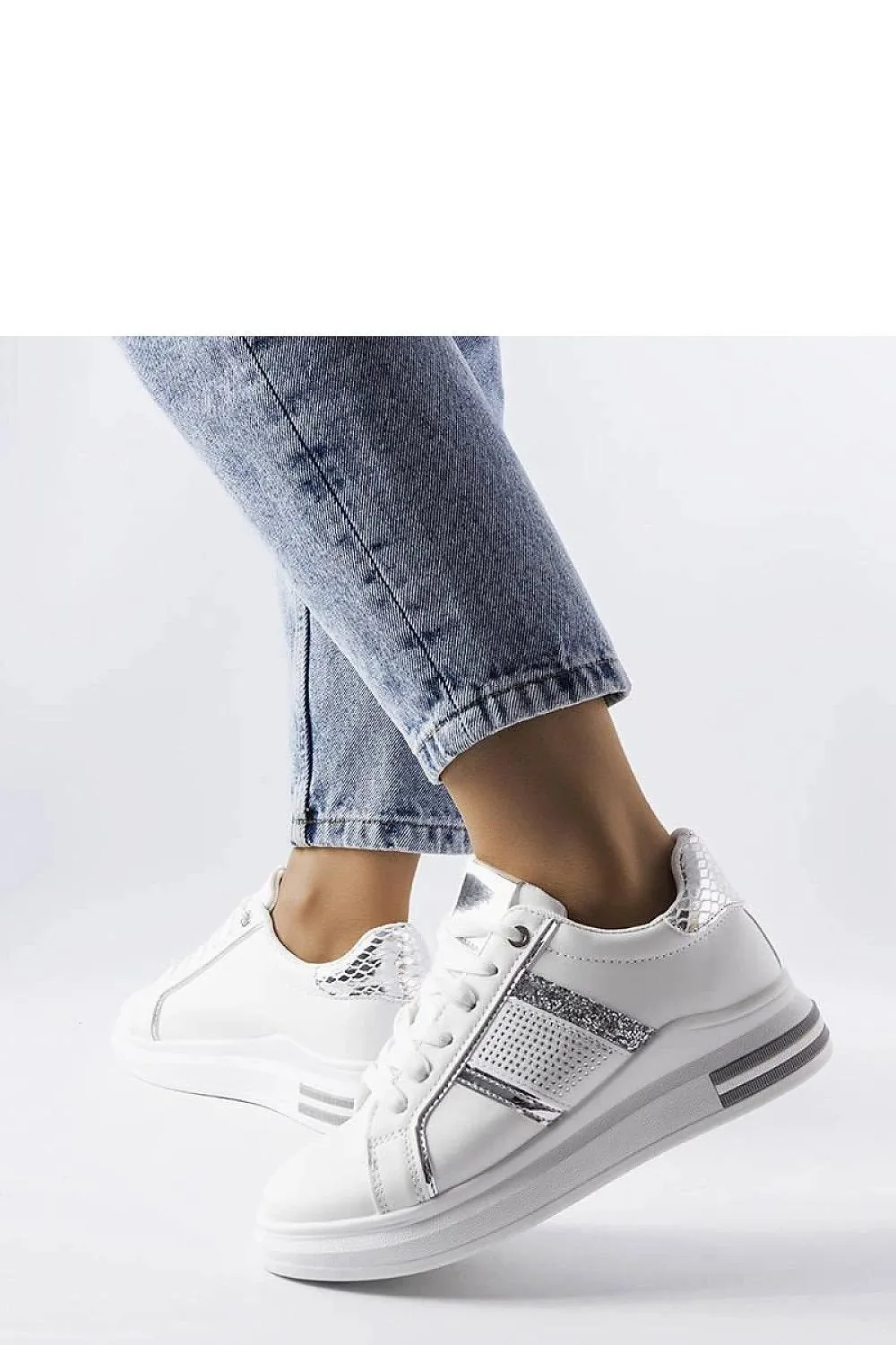 Beige sneakers adorned with rhinestones