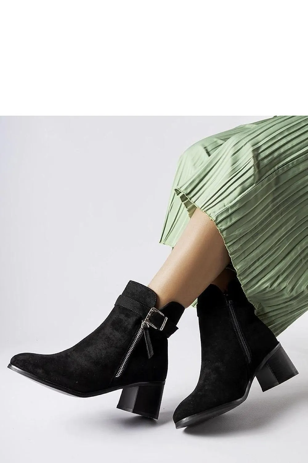 Black ankle boots on a low heel