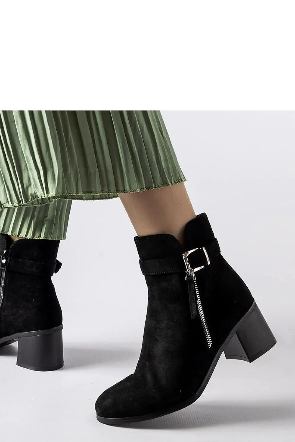 Black ankle boots on a low heel